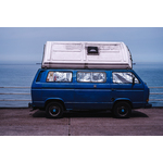 Blue van by the Ocean