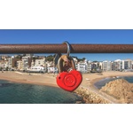 Heart lock above the beach