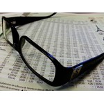 Newspapers under glasses